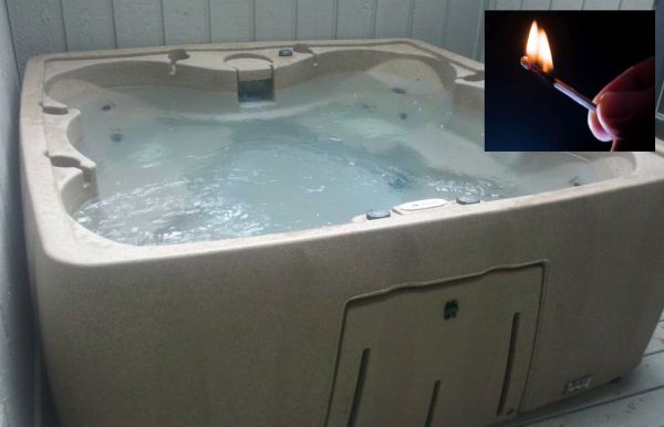 image of a bath full of water and a hand holding a lit match