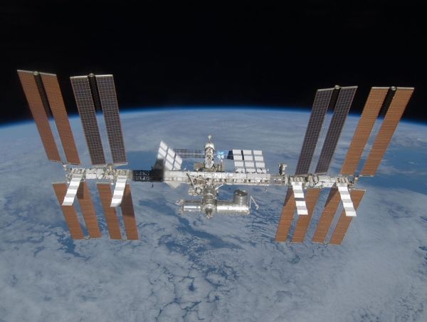 photo of the international space station with its solar cells